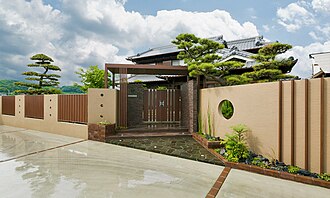 伝統的な日本家屋に新設された新素材も使用した塀